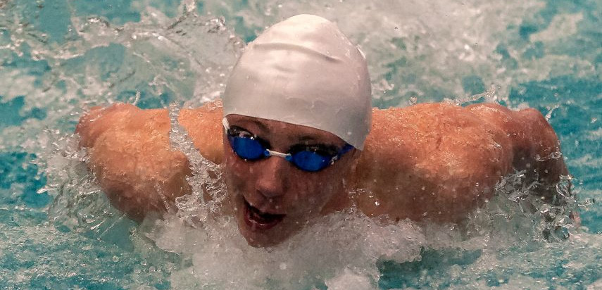 Marski swimming in the 100-yard butterfly at the Nassau County Swimming Championships on February 10, 2018