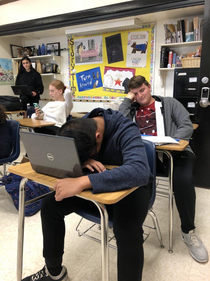 Sophomores Carl Zou (front) and Jason Huffine (back) falling asleep in class 