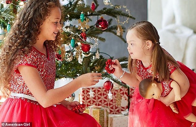 Ivy Kimble, right, is featured in the October catalog for American Girl