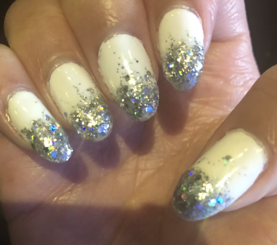 White polish with glitter tips manicure by Alexis Sooklall