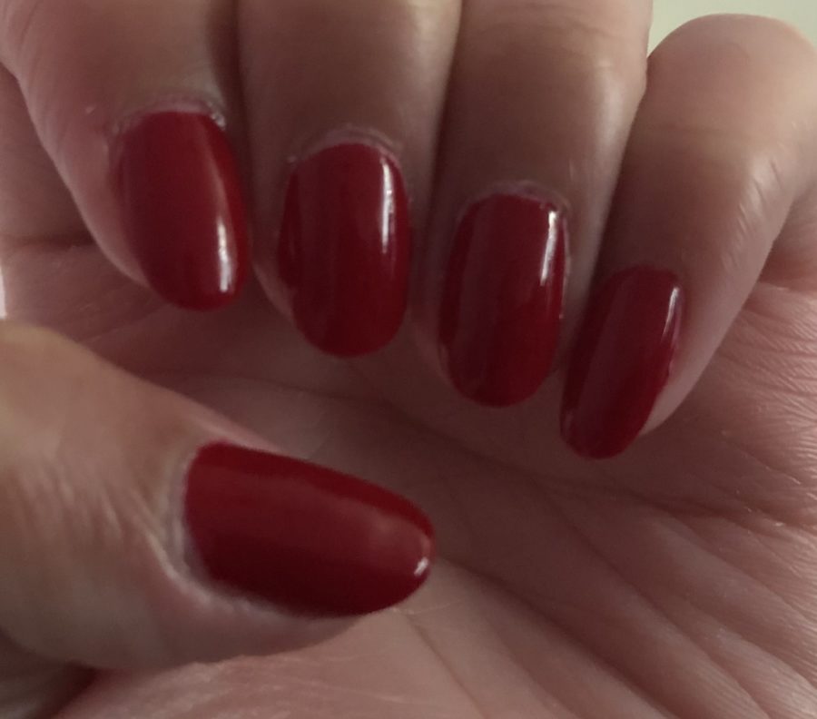 Red nails by Alexis Sooklall