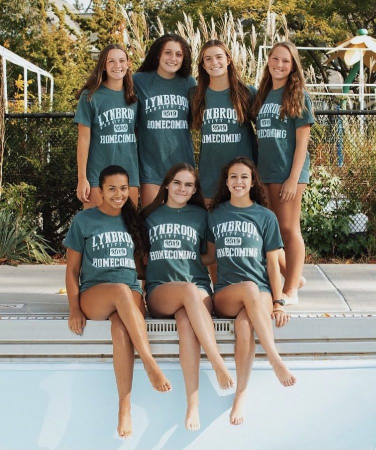 Varsity Swims (Front) Crawl to Victory