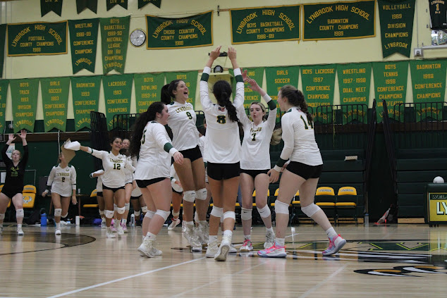 On September 16th, 2022, the Lynbrook Varsity Volleyball Team Celebrates a Victory Over the Plainedge Red Devils.