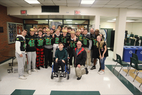 The varsity football team poses with Pugliese
Photo courtesy of the Lynbrook Public Schools Website