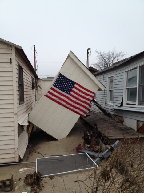 American flag hung on shed after Super Storm Sandy.