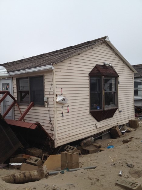 House still standing despite severe damage done by Super Storm Sandy.