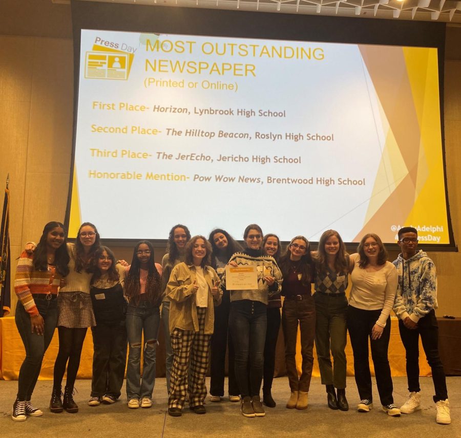 Horizon staff members pose with their Most Outstanding Newspaper Award