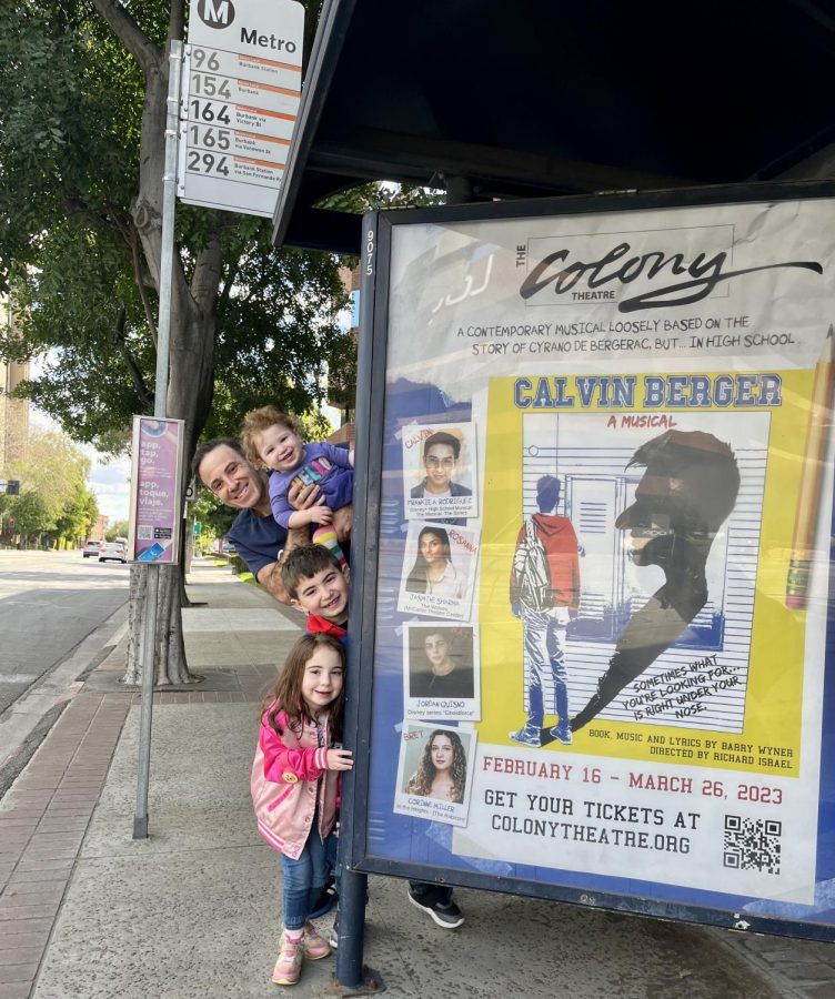 Wyner+and+his+children+with+a+Calvin+Berger+poster