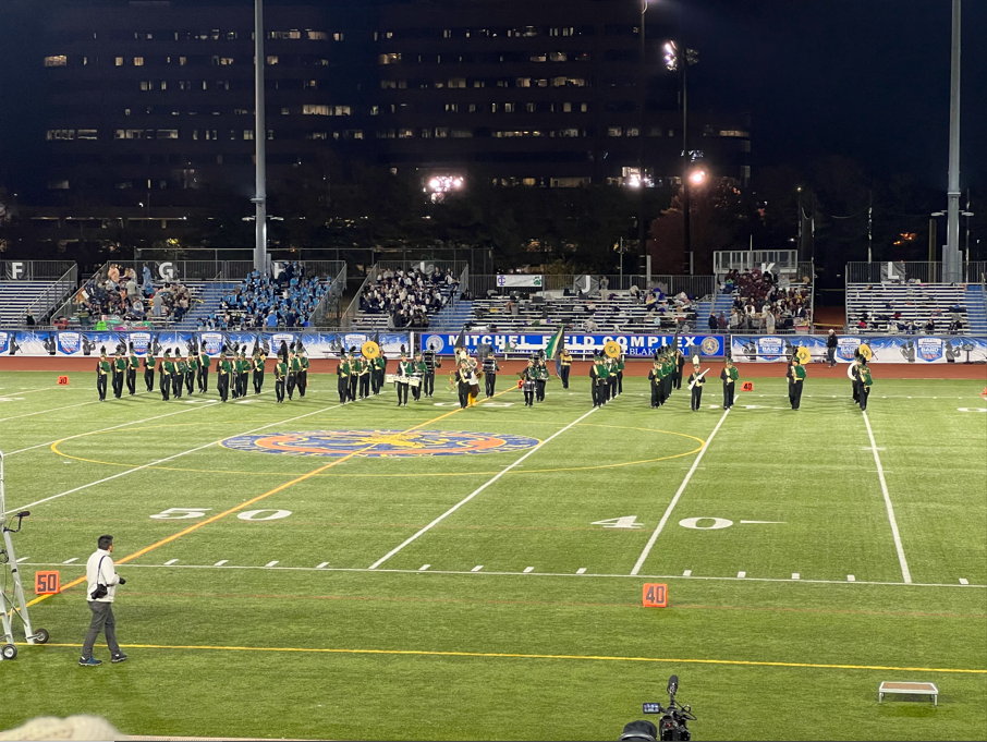 The LHS band marches onto Mitchel Field at the Newsday festival.          Courtesy of Danielle Longo
