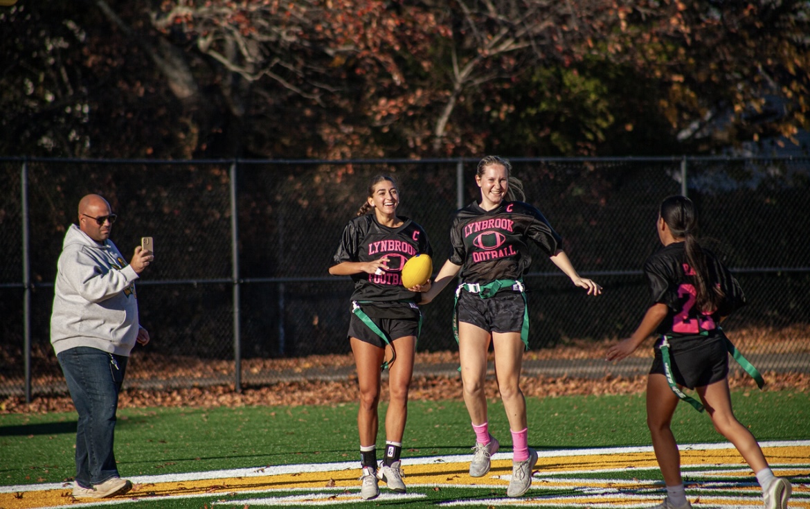 Gottlieb and Ramirez celebrating a touchdown by Mazzei. 