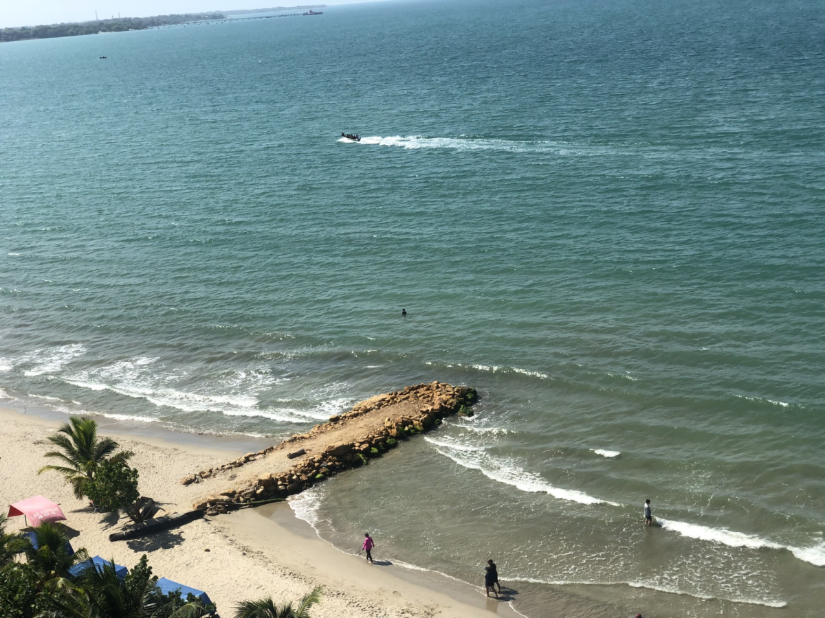 People enjoying Boca Grande Beach in Cartagena, Colombia 