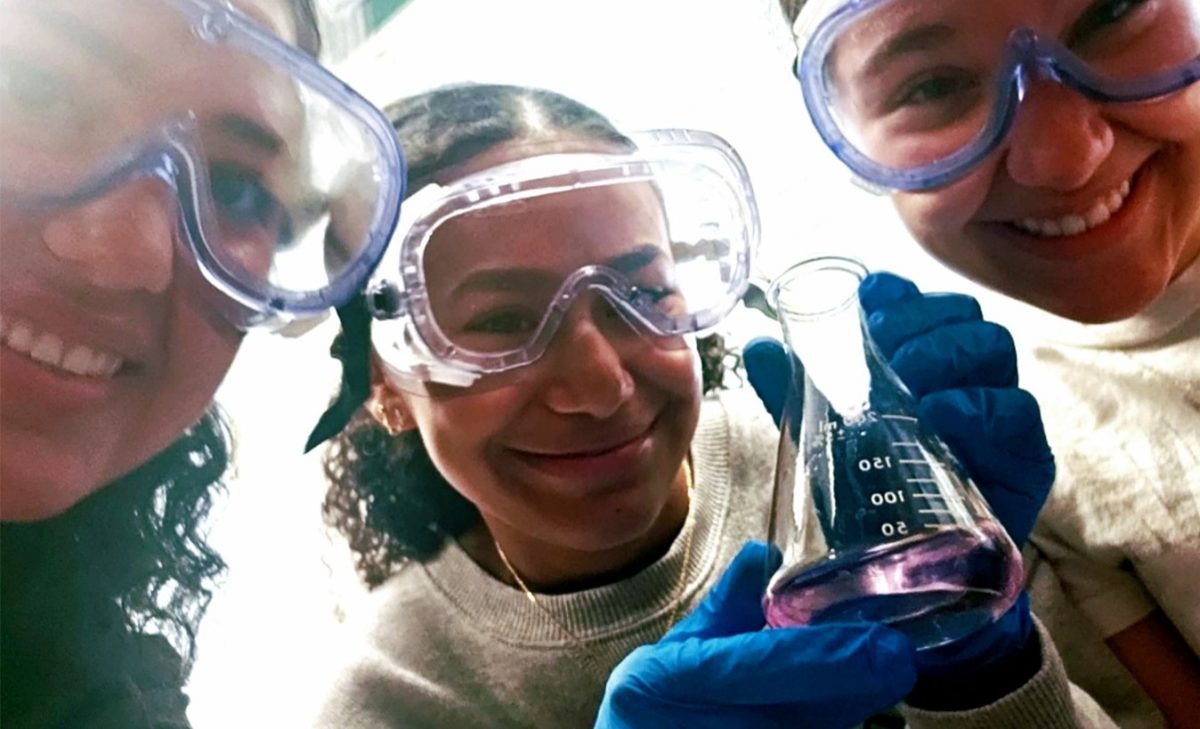Pictured are Delgado (right), Elisa Bermudez (middle), and Jasmina Mekic (left). This photo was taken after school during a make-up lab. This experiment was the titration lab. This lab had required a lot of precision and accuracy. According to Delgado, this lab may show up as one experiment to be performed with the club next year. 